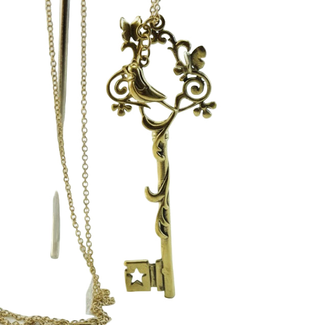 Collar colgante llave filigrana pájaro