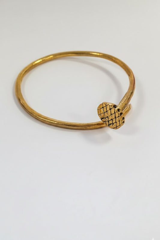 Pulsera brazalete clavo dorado
