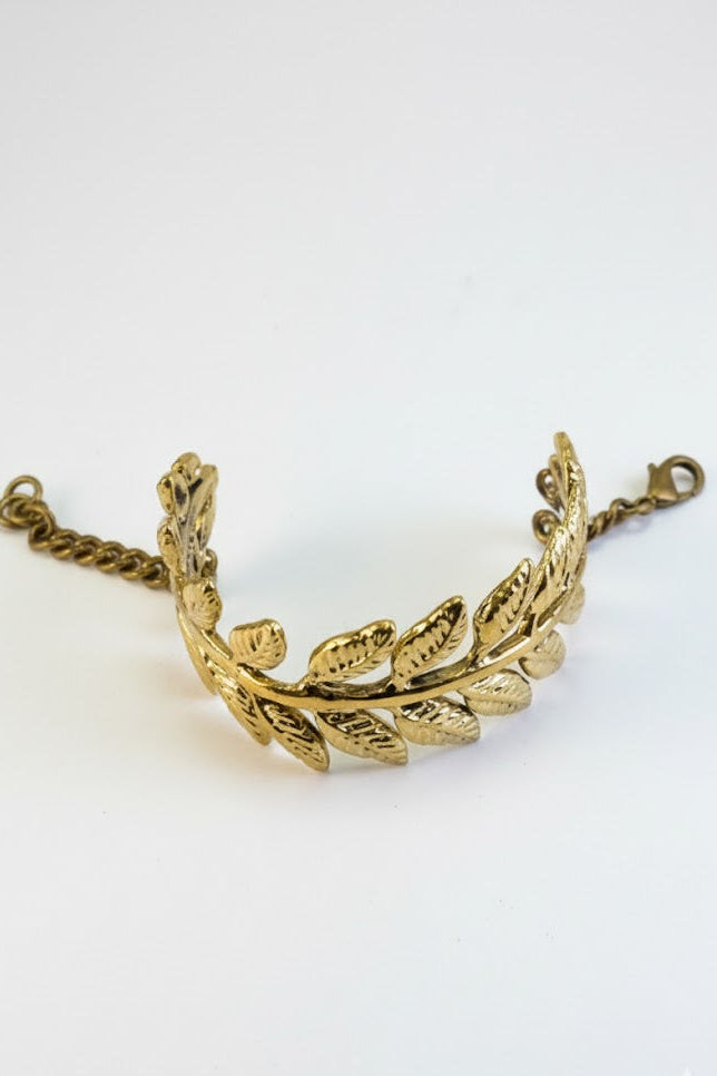 Pulsera brazalete corona de hojas doradas