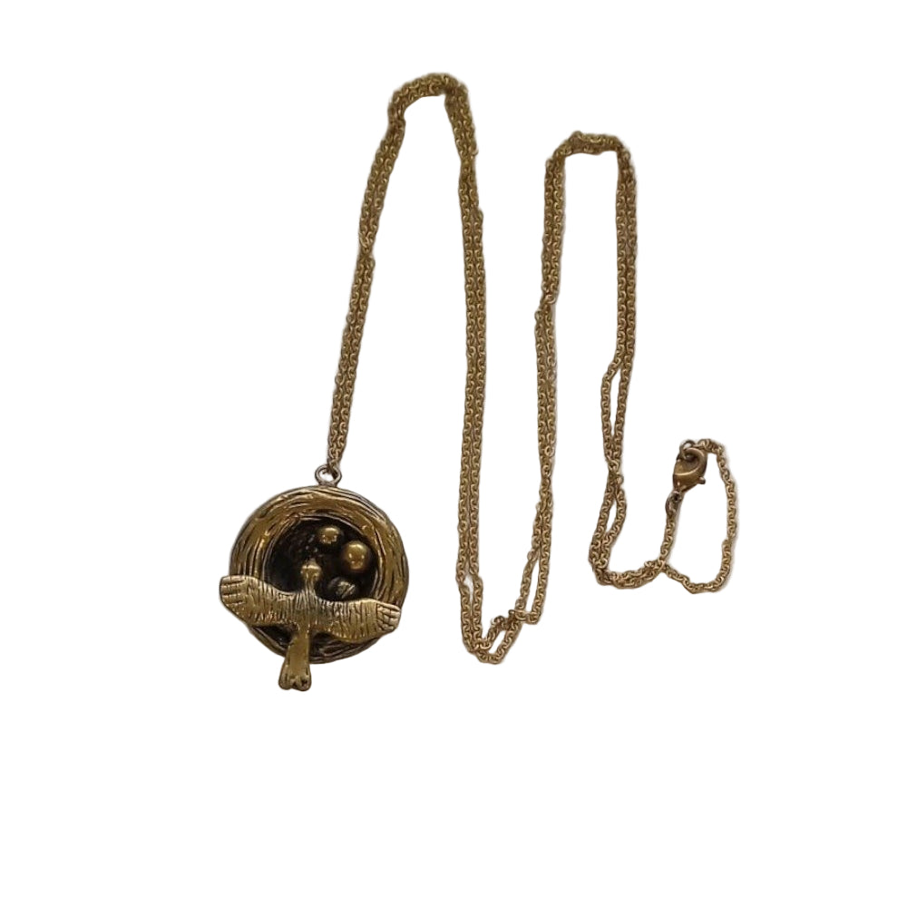 Collar colgante nido