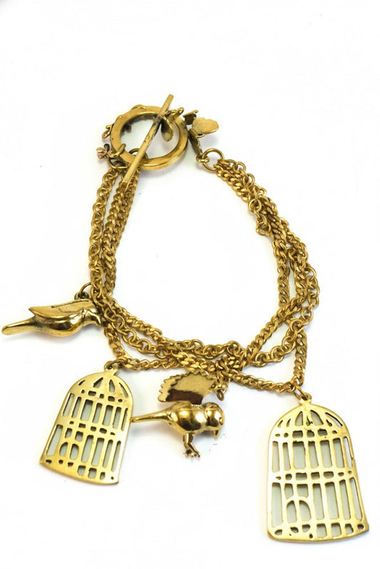 Pulsera brazalete jaulas y libertad