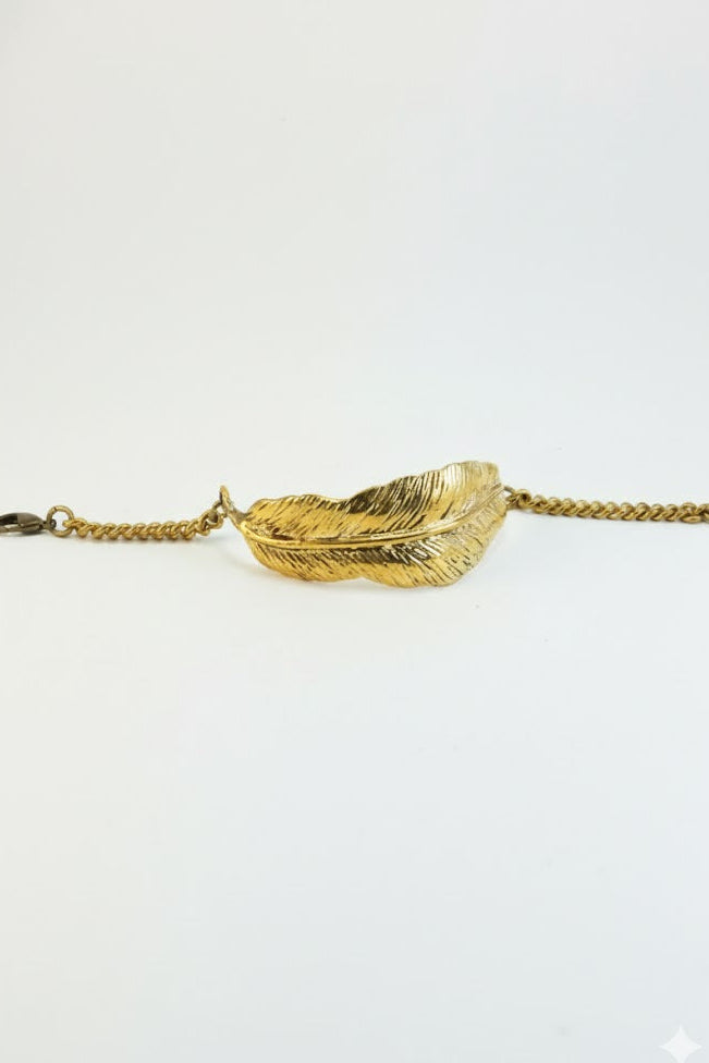 Pulsera brazalete pluma