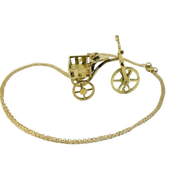 Collar colgante triciclo