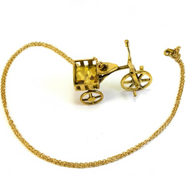 Collar colgante triciclo